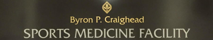 Sign reading Byron P. Craighead Sports Medicine Facility
